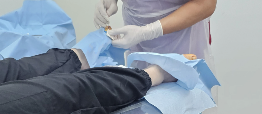 Clinical setting showing a podiatrist treating a patient’s ingrown toenail under sterile conditions.