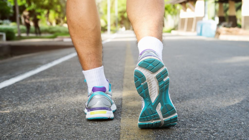 Runner’s feet during training illustrating strengthening exercises that help support the feet and reduce running foot pain