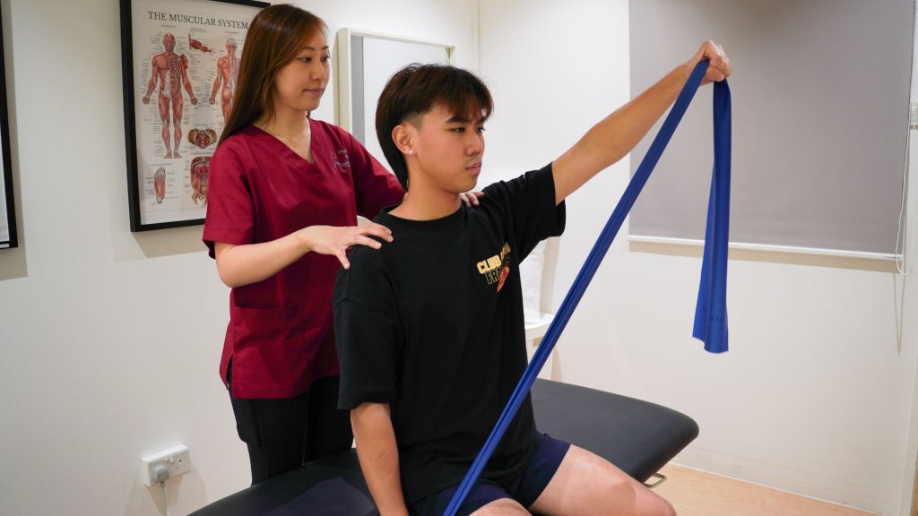 Physiotherapist guiding personalised rehabilitation exercises tailored to patient condition in Singapore clinic