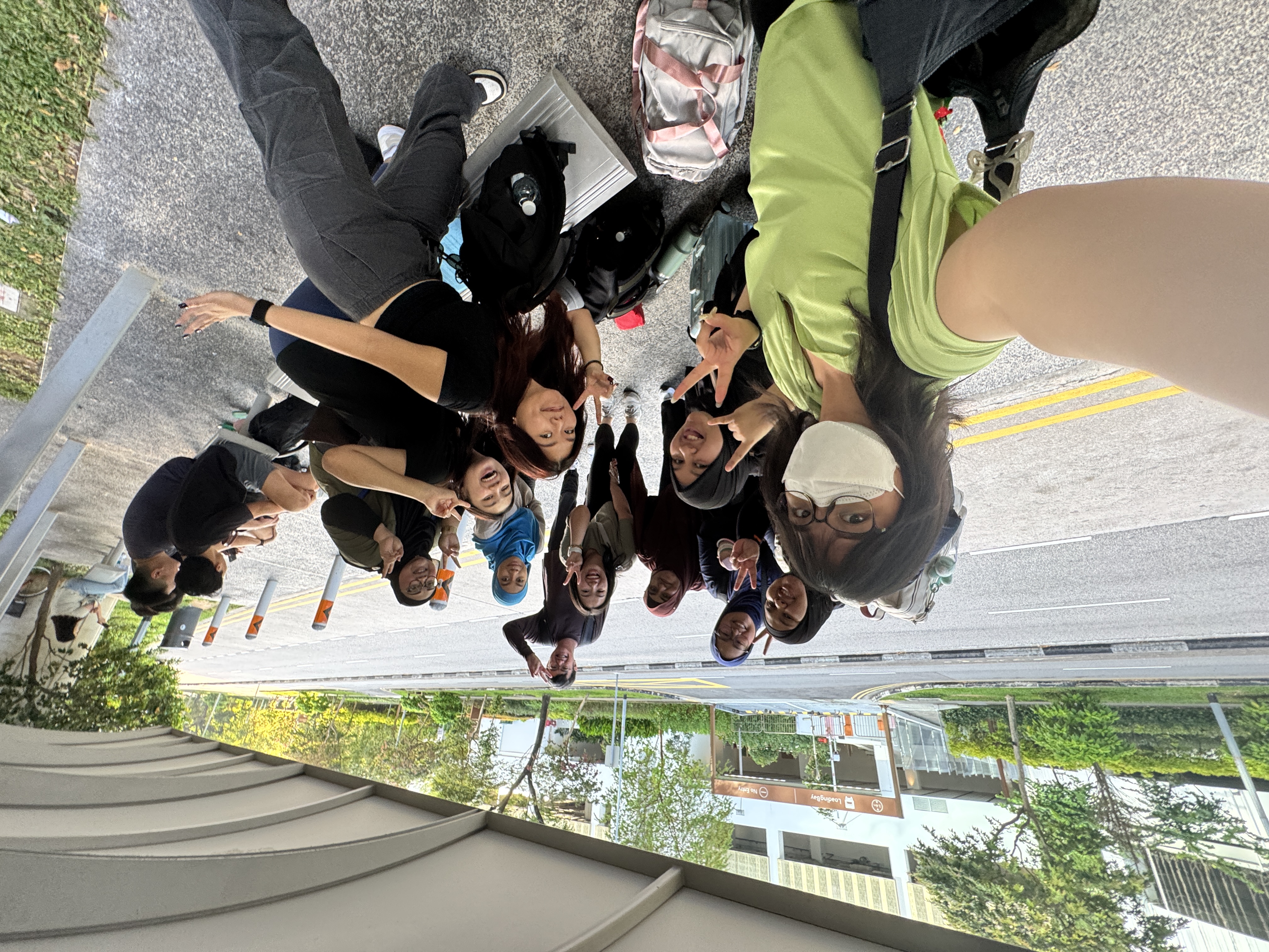 Physio & Sole Clinic colleagues taking a cheerful group selfie