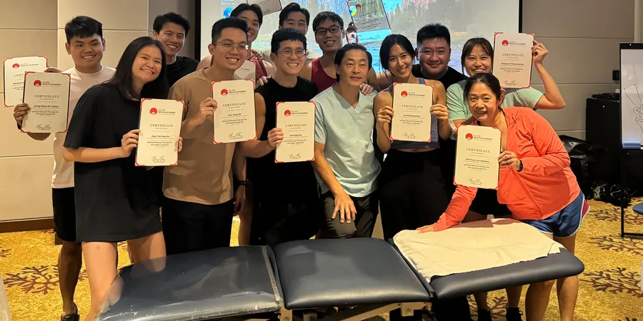 PSC clinicians holding their Allied Health Academy course certificates