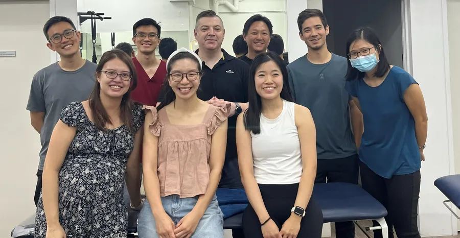 PSC clinicians together in the clinic's treatment room