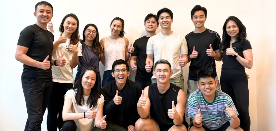 The team giving a thumbs up after a session