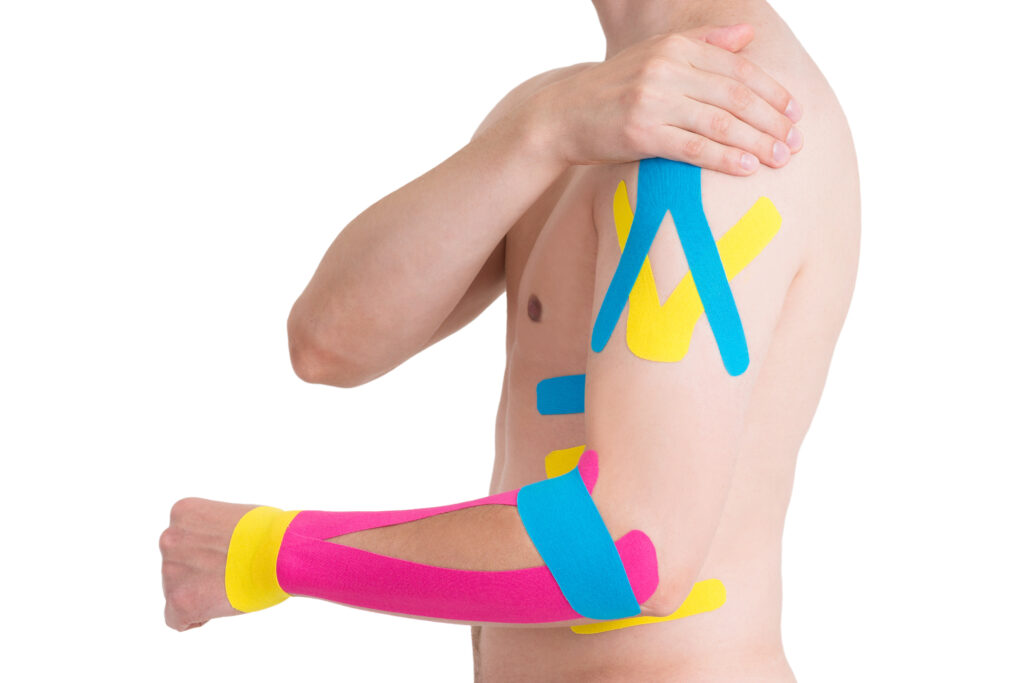 a man with sports tape on his arm