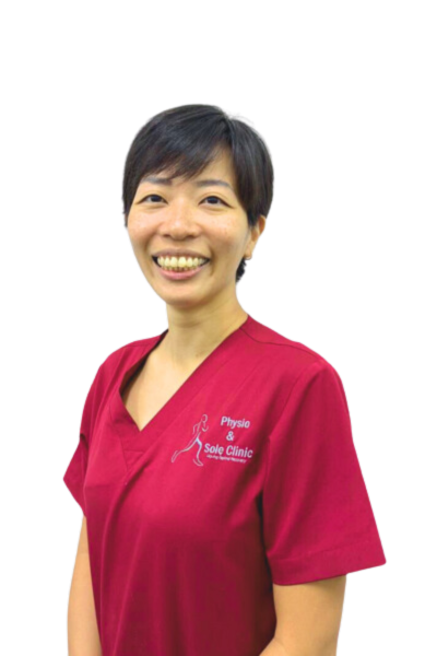 Physio and Sole Clinic Principal Musculoskeletal Physiotherapist Candice in red scrubs