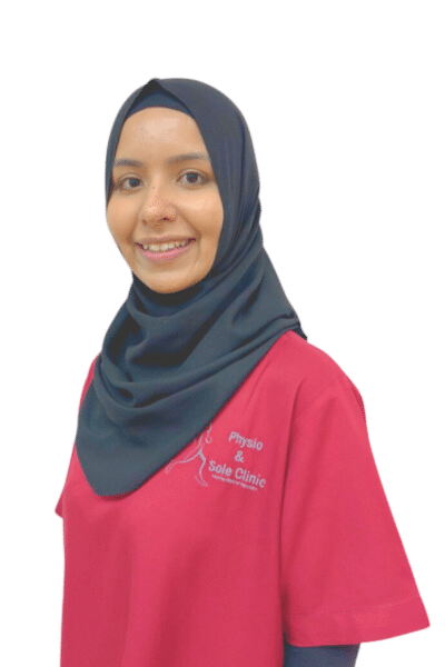 Physio and Sole Clinic Farha Nisha Principal Musculoskeletal Physiotherapist in red scrubs