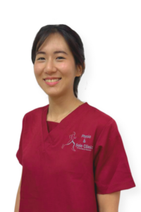 Physio and Sole Clinic Senior Musculoskeletal Physiotherapist Felicia in red scrubs