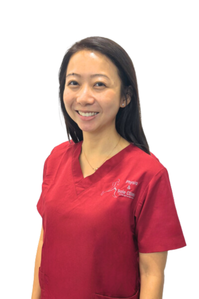 Physio and Sole Clinic Director & Chief Podiatrist Fiona in red scrubs