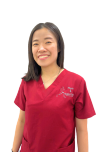 Physio and Sole Clinic Podiatrist Joanne in red scrubs