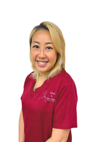 Physio and Sole Clinic Principal Musculoskeletal Physiotherapist Cindy in red scrubs