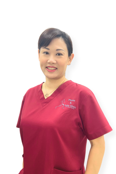 Physio and Sole Clinic Principal Musculoskeletal Physiotherapist Cheryl in red scrubs