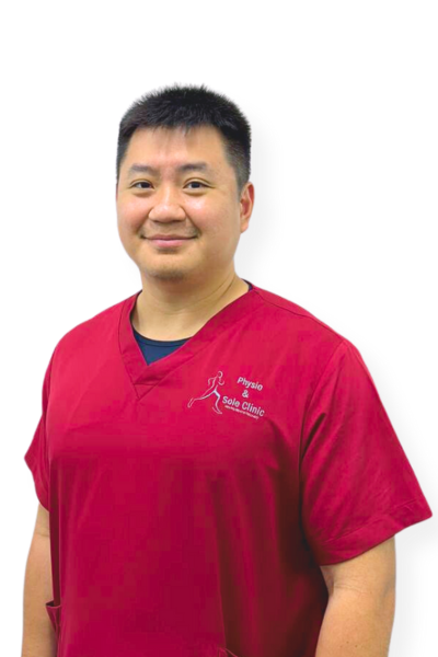 Physio and Sole Clinic Senior Musculoskeletal Physiotherapist Chester in red scrubs