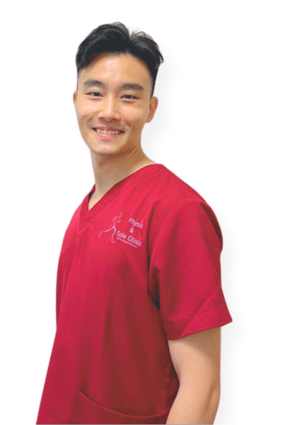 Physio and Sole Clinic senior Musculoskeletal Physiotherapist Hao Xu in red scrubs