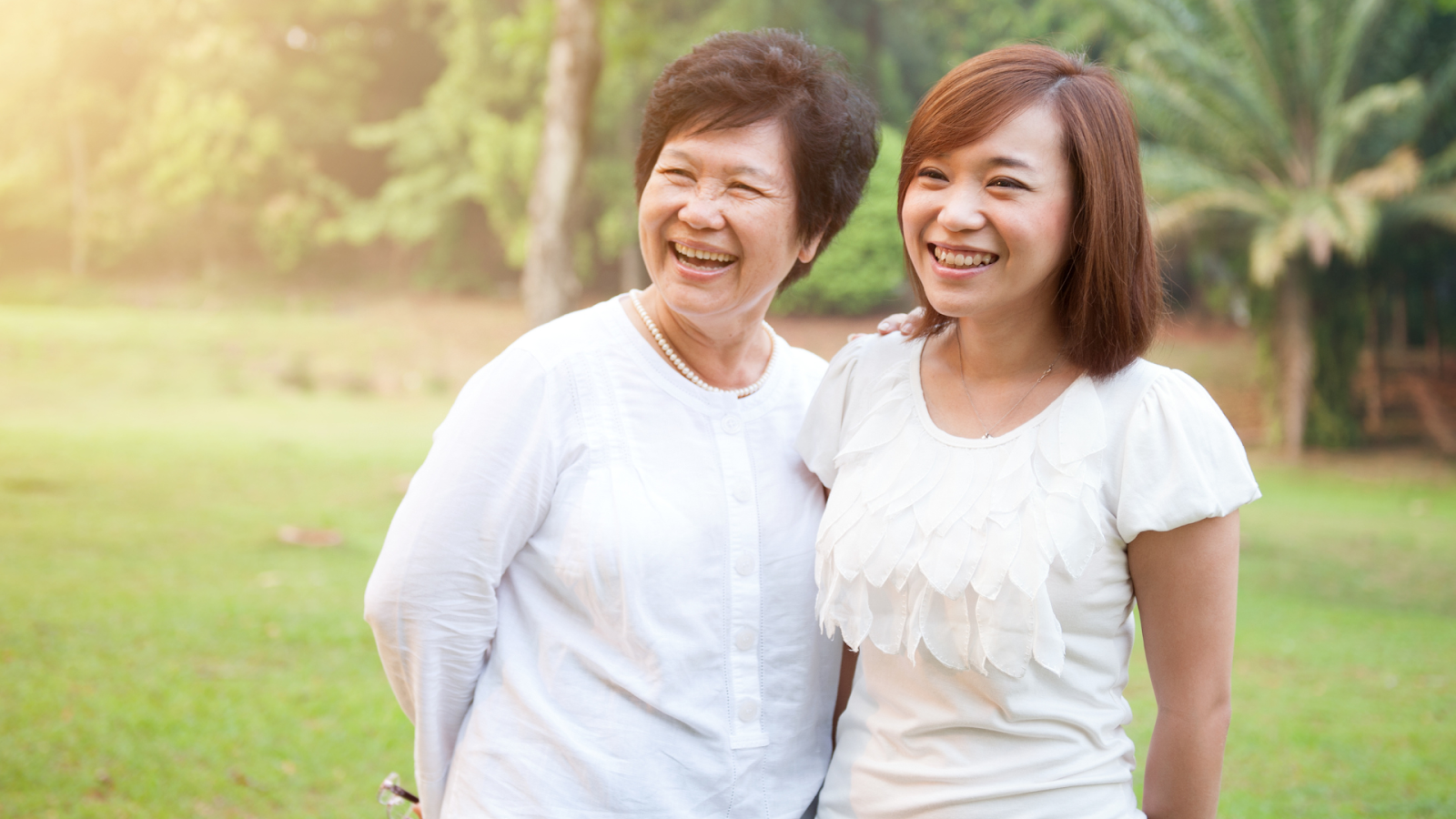 Senior woman enjoying quality time outdoors with her daughter