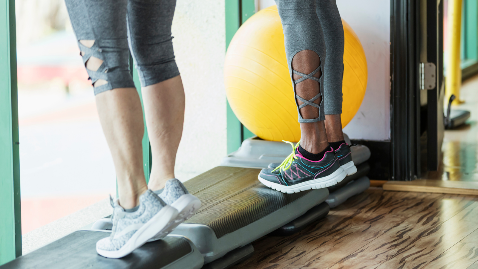 Physiotherapist/podiatrist guiding foot strengthening exercises for recovery from foot pain in Singapore.