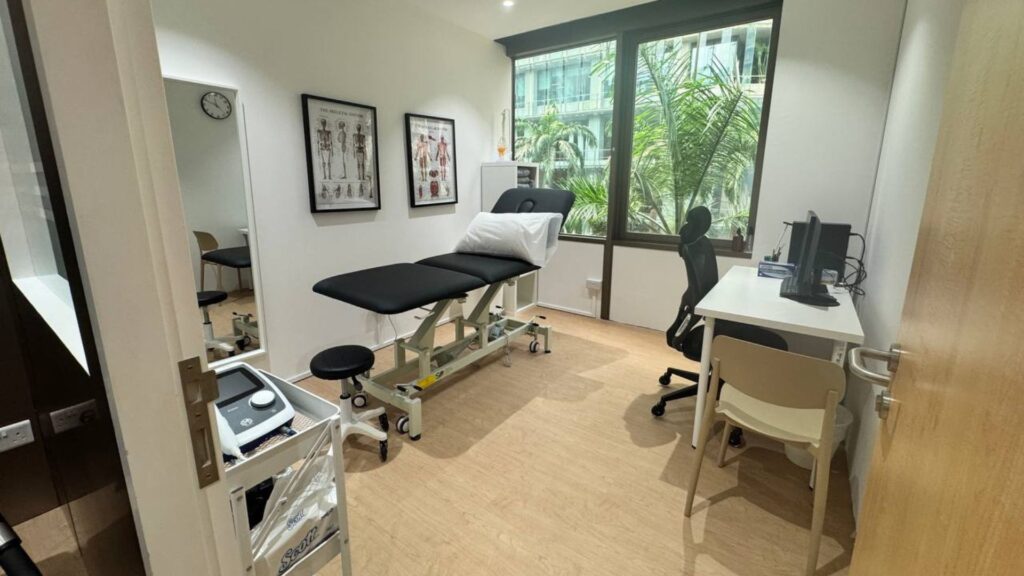 Interior view of Physio & Sole Clinic Raffles located near Telok Ayer MRT, serving working professionals in Singapore’s CBD.