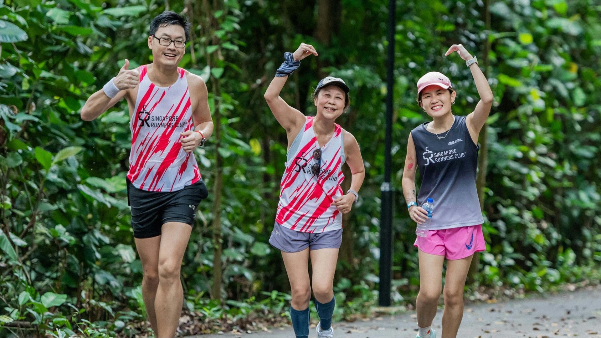 Group of recreational runners running outdoors, highlighting common foot pain after running in active adults