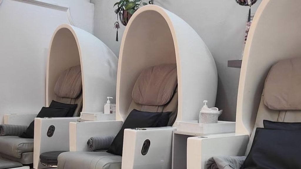Foot spa pedicure chairs used in a salon setting, creating a warm and moist environment