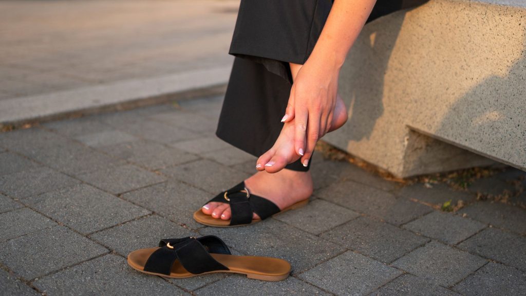 Common foot conditions treated by a podiatrist in Yishun, including heel pain and flat feet