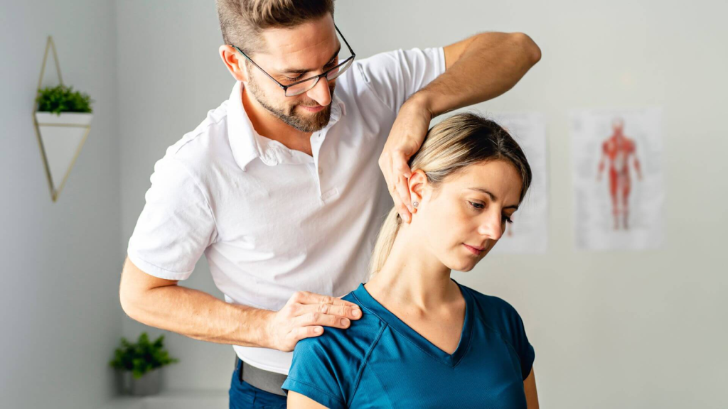 Physiotherapist assessing upper cervical spine mobility in patients with neck and jaw pain.