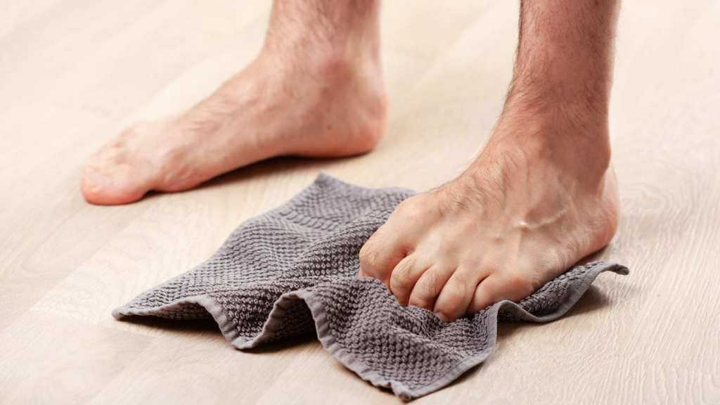 Foot intrinsic strengthening exercise using a towel scrunch to improve arch stability and support plantar fascia recovery in chronic plantar fasciitis
