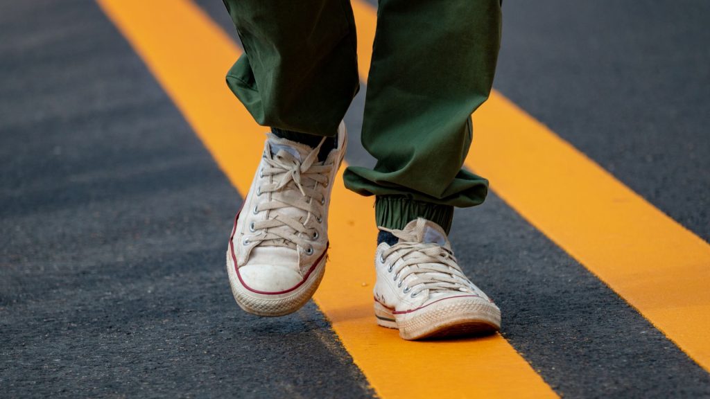 close-up of walking shoes showing gait pattern importance for lower limb alignment and physiotherapy assessment Singapore